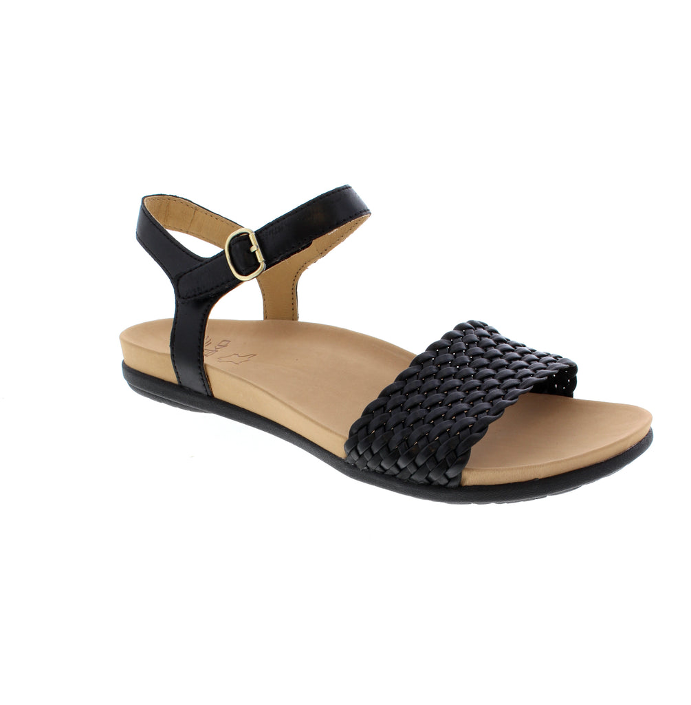 Meet the Dansko Jodie—the woven wonder that's about to become your summer staple. This sandal pairs a leather upper with a charming woven texture that adds instant visual interest to any outfit. Slip into the leather-lined interior and sink your feet into the plush suede footbed, while the EVA/PU and foam midsoles work together to keep you cushioned from sunrise to sunset. The sturdy flatform (under 1") and round-toe design strike the perfect balance between casual and put-together.