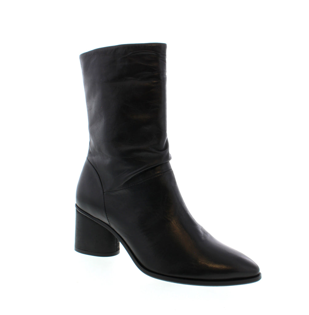 Jordyn, the mid-calf boot by Miz Mooz is a versatile and stylish choice for both the office and a night out. With its sophisticated and edgy design, this boot effortlessly complements any outfit.