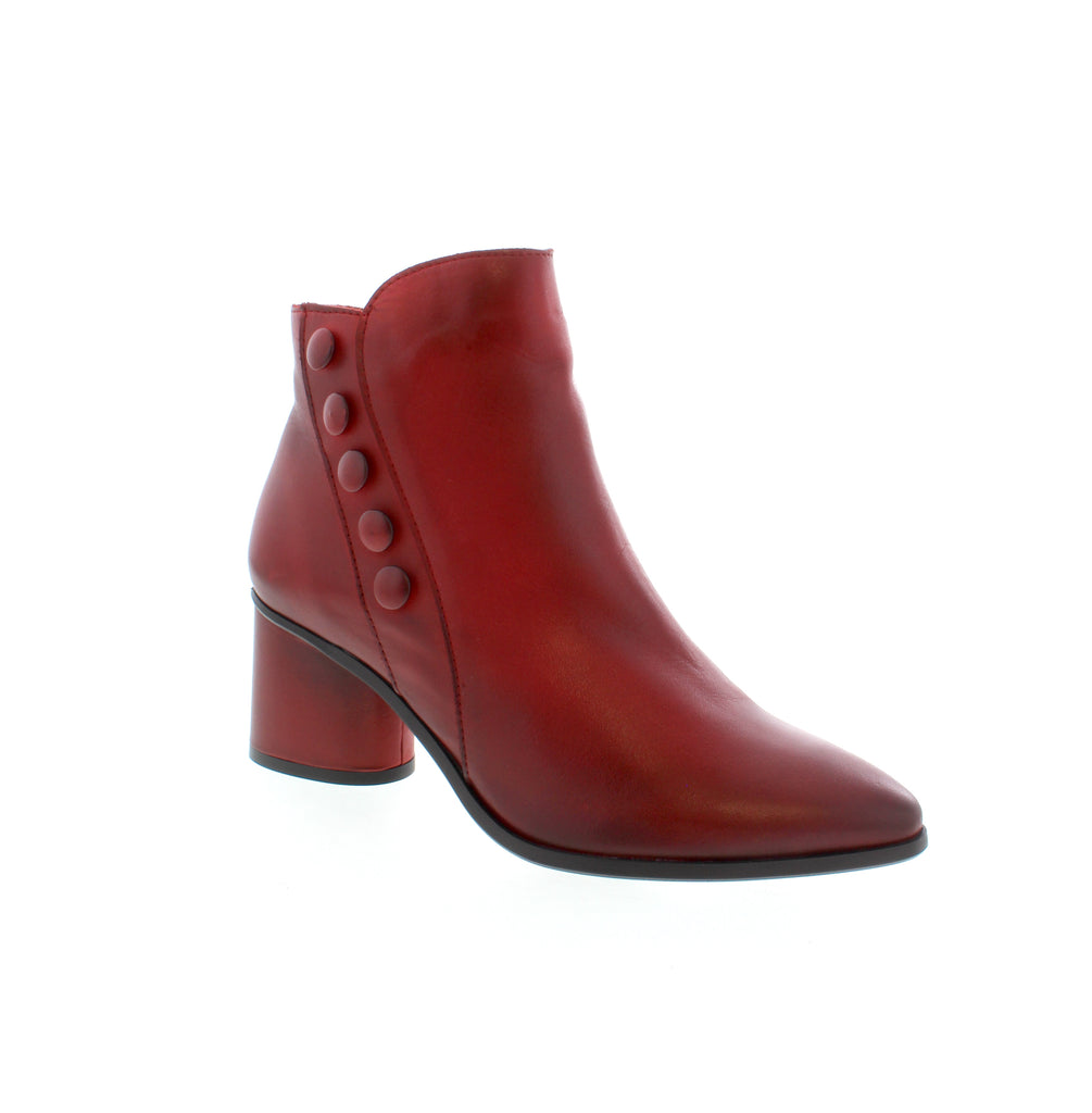 The Miz Mooz Judie ankle boot is a sleek and sophisticated choice for any occasion. Its versatile design with button detailing effortlessly elevates any outfit, making it perfect for the office or a night out.&nbsp;