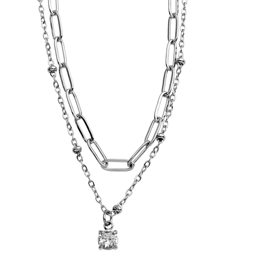 Effortlessly elevate your style with the Hackney Nine Kateri pre-layered necklace, featuring a sparkling solitaire zirconia charm that catches the light beautifully. Designed with a contemporary combination of a sleek paper-clip chain and delicate beaded chain, this versatile piece creates a polished layered look with ease.