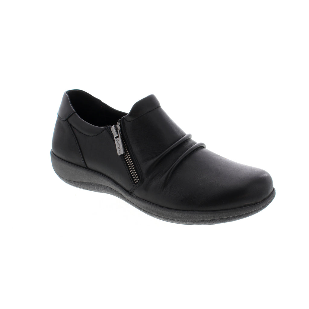 The Aetrex Katie is a stylish leather shoe with a side zipper and ruching detailing for ease of access. The built-in Aetrex Orthotic System ensures arch support and comfort with its memory foam cushioning. Perfect for all-day wear, the Katie offers sturdy support and a fashionable look.