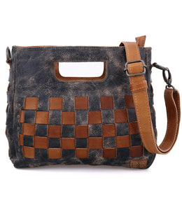 The Keiki handbag by Bed Stu has a gorgeous woven leather design to give any outfit a rustic look! Enjoy the spacious interior and convenience of this bag anywhere you go!