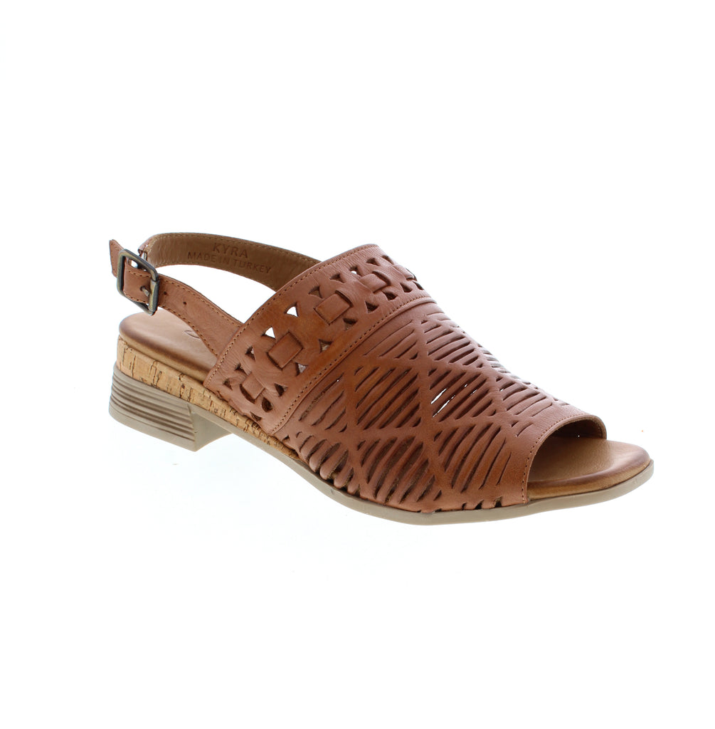 The Biza Kyra cognac tan sandal combines elegance with everyday comfort. Its perforated leather upper and slingback design offer breathability and style, while the full leather lining and footbed provide natural cushioning. The stacked heel adds subtle height, and buckle back strap closures deliver a secure, adjustable fit. A foam midsole ensures all-day comfort for casual summer wear on narrow to medium feet.