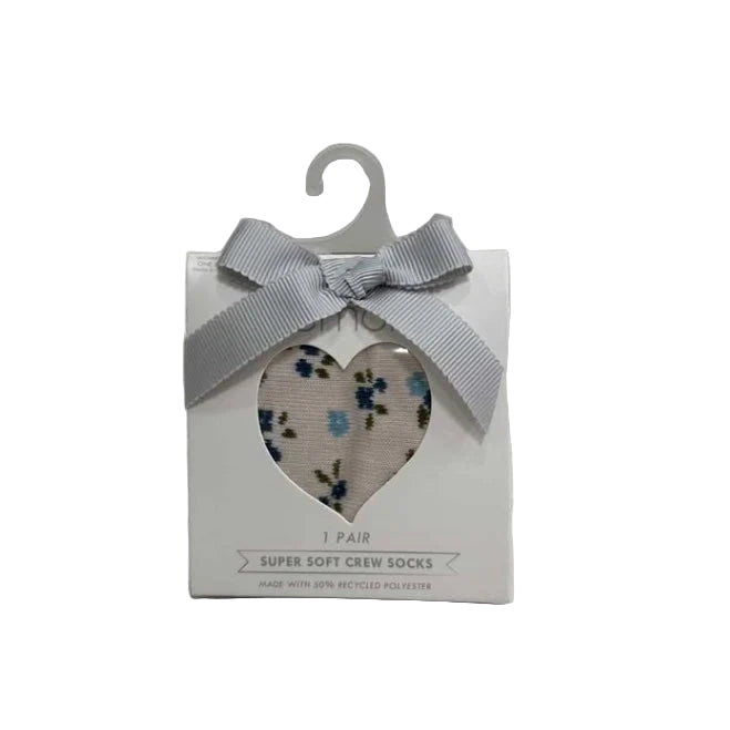 Cozy up with Lemon Pillow Recycled Crew Socks in warm brown featuring a pretty floral pattern. These ankle socks are crafted from sustainable recycled fabric with a soft polyester lining, making them a guilt-free choice for conscious shoppers. The botanical print brings a touch of nature-inspired charm to your casual wardrobe, while the crew length keeps your ankles perfectly covered.