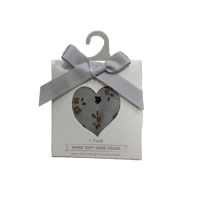 Step up your sock game with Lemon Pillow Recycled Crew Socks in olive. These cozy ankle socks feature a playful polka dot pattern that adds personality to any casual outfit. Made from sustainable recycled fabric with a soft polyester lining, they're as kind to the planet as they are to your feet. Perfect for everyday wear, these crew-length socks deliver comfort and style without compromise. 