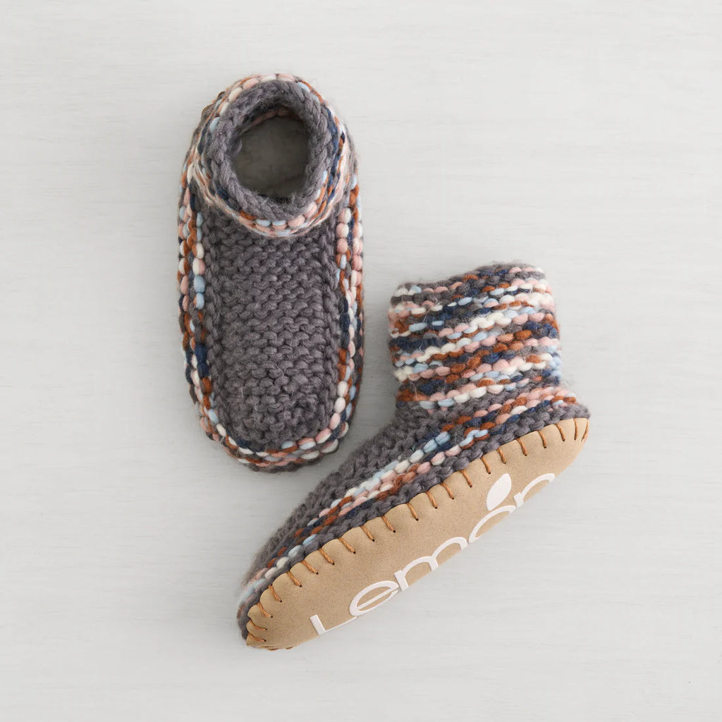 Experience pure comfort and warmth with the Lemon Aurora Bootie. Hand knit with care, these slippers provide all-day coziness. Say goodbye to cold toes and hello to ultimate relaxation.