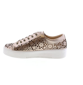 Discover the perfect balance of style and comfort with the Django & Juliette Leitha - Platino (Gold) sneakers. Featuring a perforated leather upper, round toe design, and white rubber sole, these sneakers are ideal for all-day wear. The metallic and floral patterns add a touch of elegance, while the foam midsole and leather lining ensure maximum support and breathability. Plus, the removable orthotic-friendly footbed and side-zip and lace-up closures make these sneakers a versatile and practical choice.