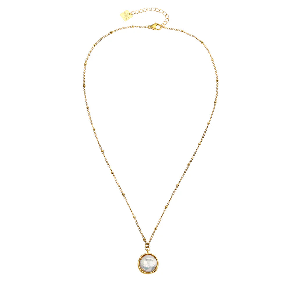  Elevate your jewelry game with the Hackney Nine Lerati necklace. Its timeless design, featuring a beaded chain and freshwater pearl pendant, exudes elegance and simplicity. Crafted from premium recycled metal layered in 18K gold, it's also non-allergic and free of harmful materials for worry-free wear.