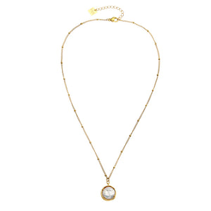  Elevate your jewelry game with the Hackney Nine Lerati necklace. Its timeless design, featuring a beaded chain and freshwater pearl pendant, exudes elegance and simplicity. Crafted from premium recycled metal layered in 18K gold, it's also non-allergic and free of harmful materials for worry-free wear.