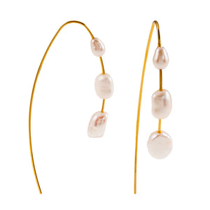 Introducing Hackney Nine's Lisanne Gold earrings. Featuring a sleek geometric hoop silhouette adorned with three lustrous fresh-water pearls, these earrings effortlessly blend modern design with classic elegance. Perfect for any occasion, they add a touch of sophistication to any ensemble.