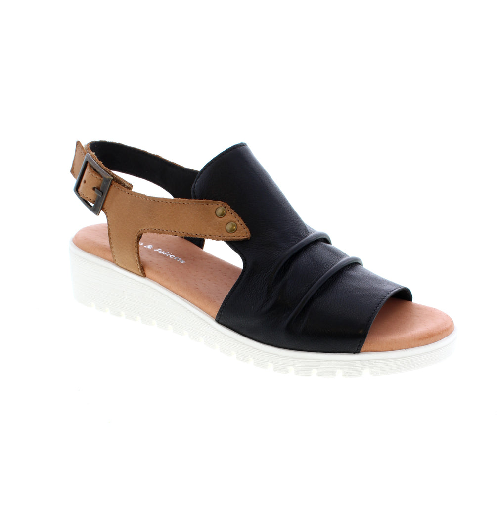 Django & Juliette Madis sandals combine timeless elegance with everyday comfort. Crafted from premium leather with a supportive foam midsole and flexible rubber outsole, these slingback sandals feature a modest 1-2" wedge heel for gentle lift. Perfect for both casual outings and dressier occasions.