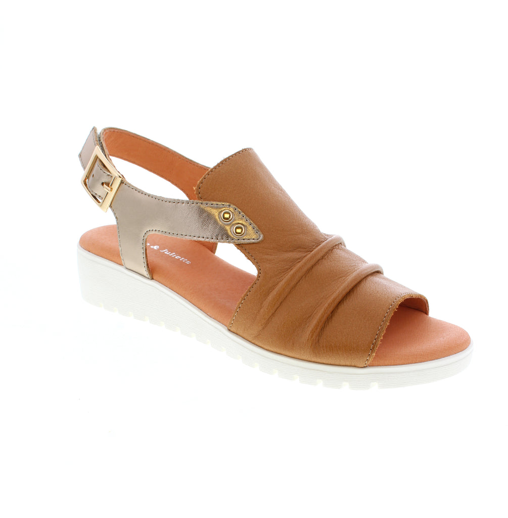 Django & Juliette Madis sandals combine timeless elegance with everyday comfort. Crafted from premium leather with a supportive foam midsole and flexible rubber outsole, these slingback sandals feature a modest 1-2" wedge heel for gentle lift. Perfect for both casual outings and dressier occasions.