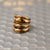 Elevate your style with the versatile Hackney Nine Market - Gold ring. Made from 18-karat traditional gold. This 4 in 1 ring is a must-have for any accessory lover.