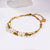 The Hackney Nine Marenta Bracelet is a sophisticated bracelet with gold beads and freshwater pearls.  Elevate any outfit with this stunning beauty. Tarnish free and non-allergic.
