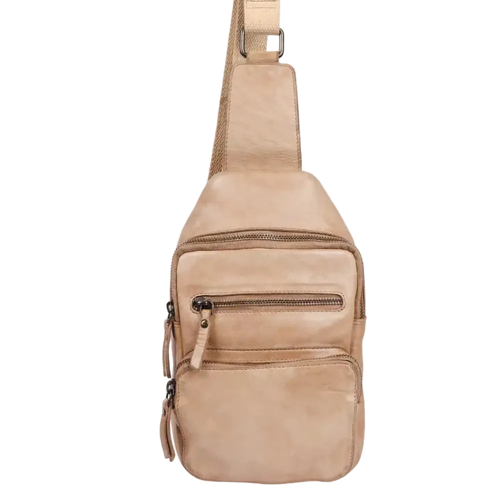 The Milo Martina is a versatile sling backpack designed for everyday. Crafted from stylish washed leather with a fabric lining, it features a zip closure and front zip pocket for secure storage. Inside, you'll find cardholder slots to keep your essentials organized. The adjustable shoulder strap ensures a comfortable fit for all-day wear.