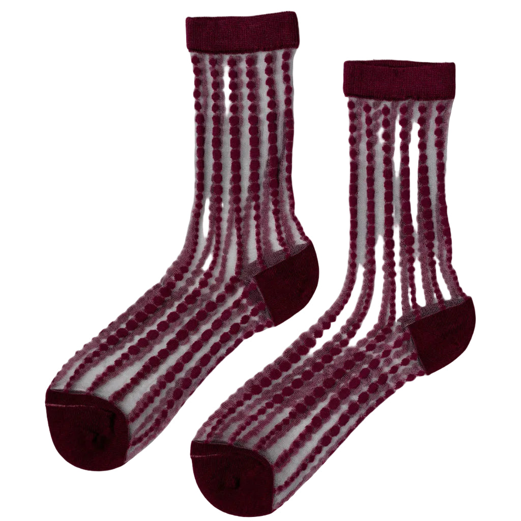 Elegant and unique, these sheer crew socks feature delicate bubble patterns in varying sizes that evoke the sparkle of champagne. The refined design elevates everyday wear with a touch of luxury. Choose from timeless Black, soft Ivory, or rich Merlot to complement your personal style. Hand wash or use a delicate cycle to maintain their beauty. Composition: 43% Polyester, 37% Cotton, 18% Nylon, 2% Spandex.