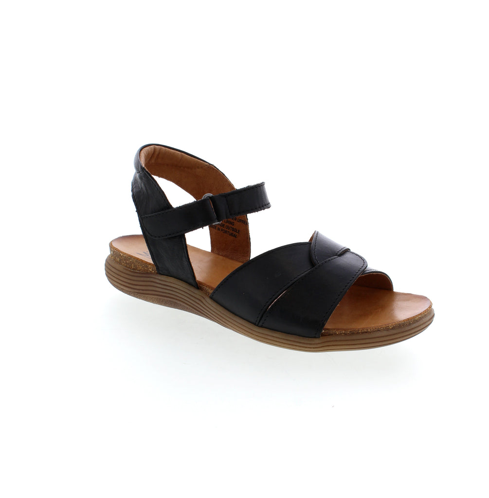 Elevate your style and comfort with the Miz Mooz Milli sandal. Crafted with sleek leather and a sturdy ankle strap, this versatile sandal is perfect for day or evening wear. Make a statement with its unique design and effortlessly elevate any outfit.