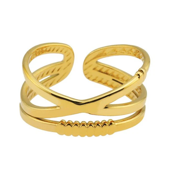 Create a striking stacked look with the Hackney Nine Miranda - Gold! This ring boasts a unique crossover double-band design, accented by a single band for a stylish and effortless finish. Make a statement with this gorgeous piece that blends modern and classic elements.