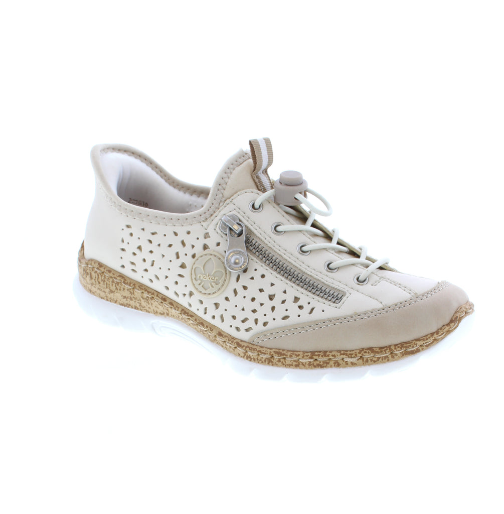 Meet your new go-to casual shoe! This Rieker N42V3-60 slip-on blends perforated leather and man-made materials in a chic cream tone with an almond toe silhouette. The bungee lace closure keeps things snug, while the memory foam midsole and microfiber insole cradle your feet in comfort.