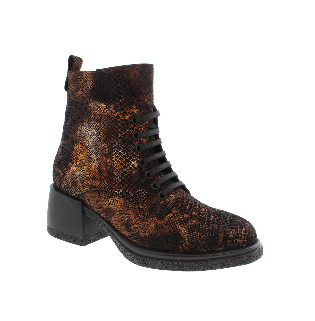 Step out in style with the Anzia Sylvia in Copper Multi! This colorful print boot pairs a bold block heel with a playful lace-up design, creating a look that’s both fun and feminine. Orthotic-friendly with a removable insole and a handy side zipper, it’s as comfortable as it is eye-catching. Make every step a statement!
