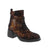 Step out in style with the Anzia Sylvia in Copper Multi! This colorful print boot pairs a bold block heel with a playful lace-up design, creating a look that’s both fun and feminine. Orthotic-friendly with a removable insole and a handy side zipper, it’s as comfortable as it is eye-catching. Make every step a statement!