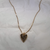 The LOLO Black Onyx Heart necklace is crafted with 18K gold and a natural Black Onyx stone, the perfect necklace for any outfit. 