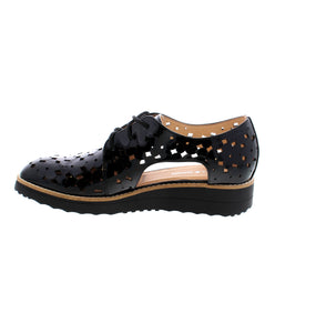 Crafted with optimal comfort and style in mind, the Django & Juliette Otay in Black features a perforated and patent leather upper, an almond toe, and a foam midsole. Perfect for casual occasions and ideal for the spring and summer season, these flats offer a true-to-size fit for narrow to medium feet. The leather footbed and platform heel of less than 1 inch provide long-lasting support. Completed with a lace-up closure, this solid patterned shoe is a must-have in any woman's wardrobe.