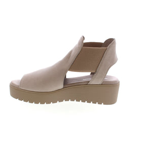 Get ready for summer with these comfortable and stylish Django & Juliette Ozie sandals. Made with genuine leather and an elasticized upper for the perfect fit, these slip-on sandals feature a round and open toe style, perfect for casual occasions. The rubber outsole and foam midsole provide durability and support, while the 1-2