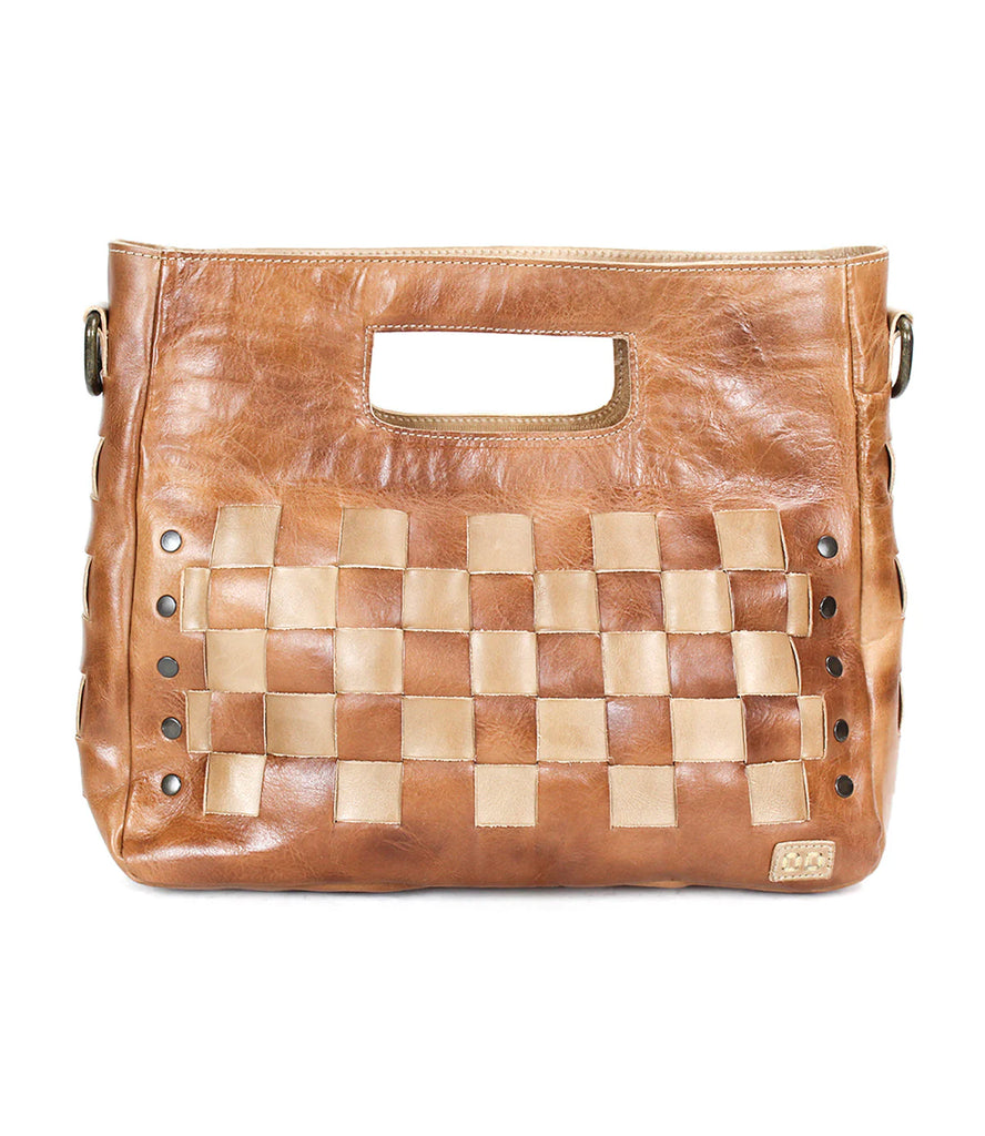 The Orchid handbag by Bed Stu has a gorgeous woven leather design to give any outfit a rustic look! Enjoy the spacious interior and convenience of this bag anywhere you go!