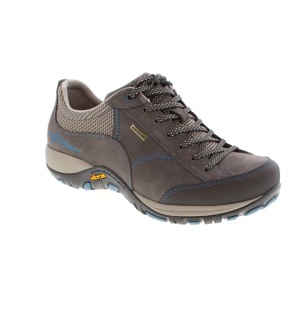 The Dansko Paisley combines durable waterproof leather with expert craftsmanship to keep your feet dry and comfortable on any trail. Its triple-density footbed offers superior cushioning, delivering exceptional support for extended outdoor adventures. Designed for durability and comfort, this shoe is ideal for those who demand reliable performance in rugged conditions.