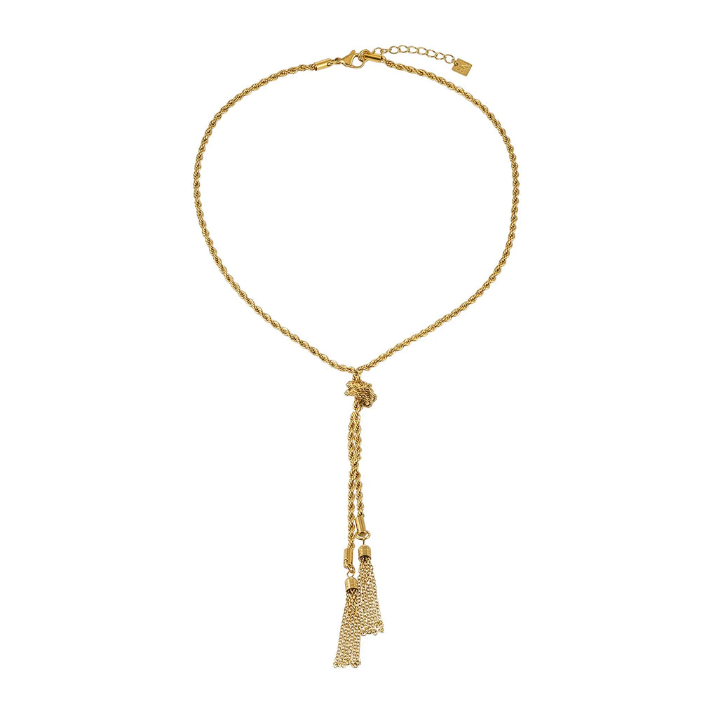 Elevate your everyday style with the Hackney Nine Pio necklace. Featuring a delicate twisted-rope design, it gracefully follows the neckline before cascading into a sophisticated drop adorned with shimmering chain tassels. An adjustable clasp allows for a customized fit, making it perfect for layering or wearing as a statement piece on its own.