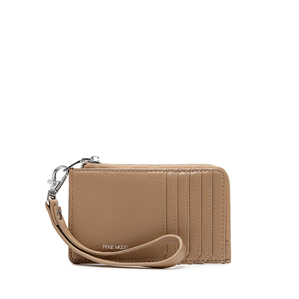 The Pixie Mood Quinn card holder features a slim profile with five card slots and a zip-around coin compartment. For added convenience, it now includes a wristlet strap for easy carrying. Keep your essentials organized and accessible with this stylish and functional wallet.