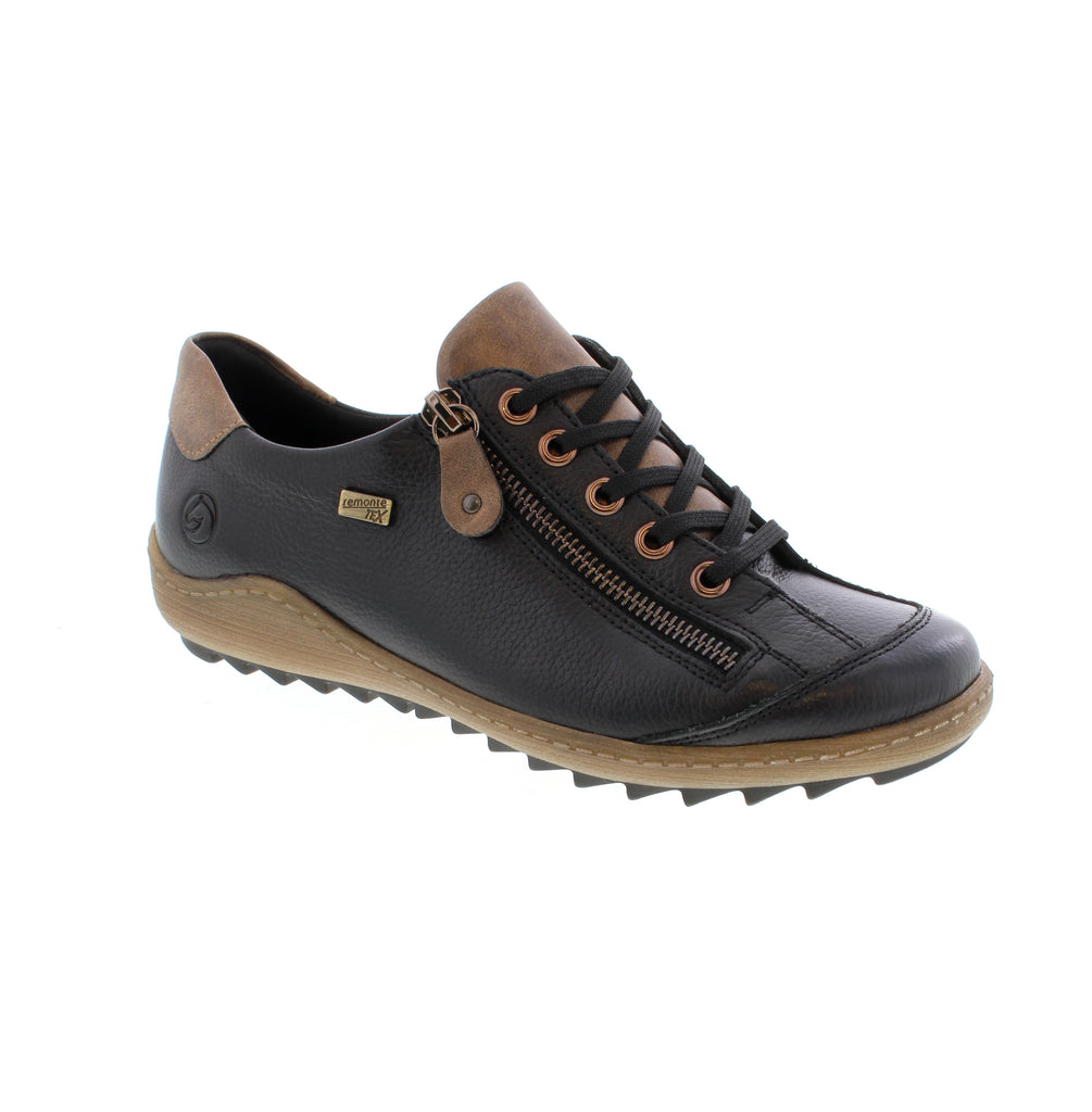 The Remonte R1402-08 in Black blends sophisticated design with functional innovation. Combining traditional lacing with a convenient zipper, these shoes provide secure support and effortless entry. The padded removable insole ensures lasting comfort. This model is a smart choice for those valuing both style and practicality in everyday footwear.