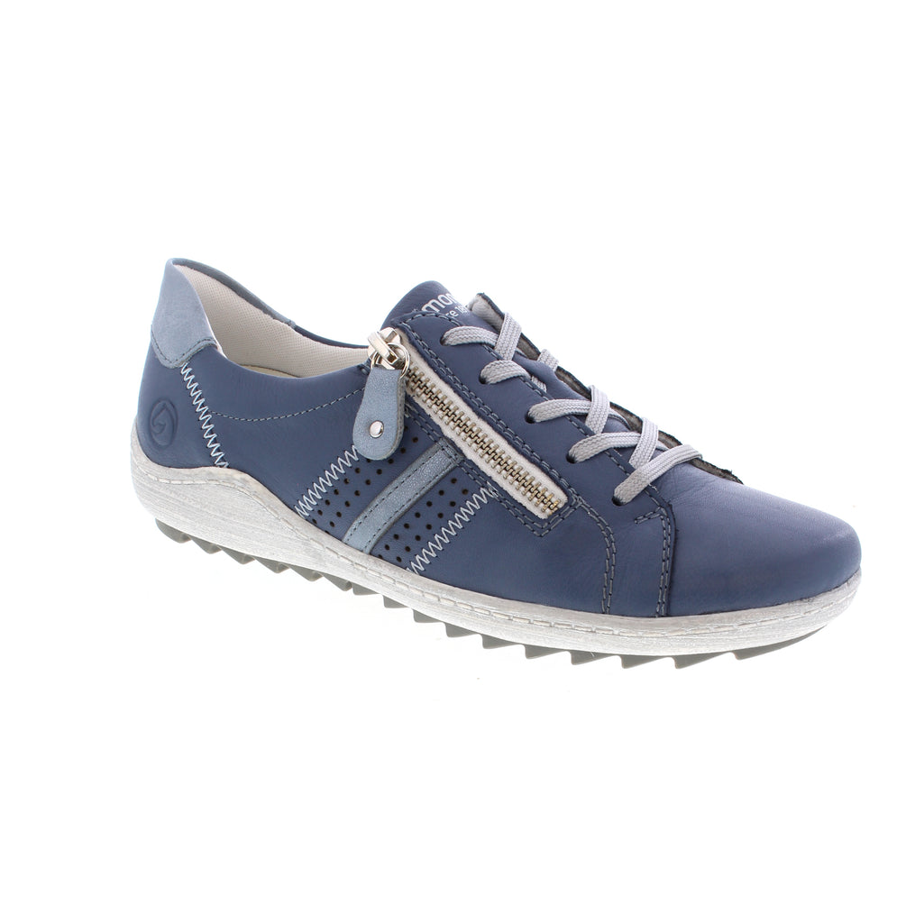 Discover refined comfort with the Remonte R1432-15, a versatile sneaker that marries contemporary design with practical functionality. Constructed with a leather upper and round toe, this shoe features dual closure options lace-up and side-zip for easy on and off. The foam midsole delivers shock absorption with every stride, while the removable microfiber insole provides personalized cushioning and support.