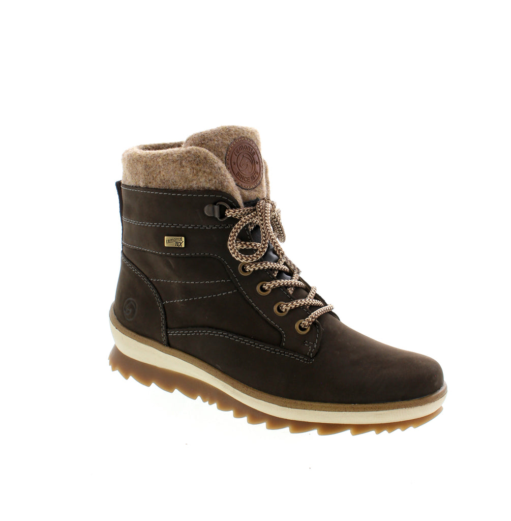 Experience exceptional comfort and style with the Remonte R8477-46 insulated boots. Featuring a convenient zipper, sturdy sole for excellent grip, and a warm wool lining, these lace-up boots are perfect for colder weather. Stay fashionably warm with these must-have boots.