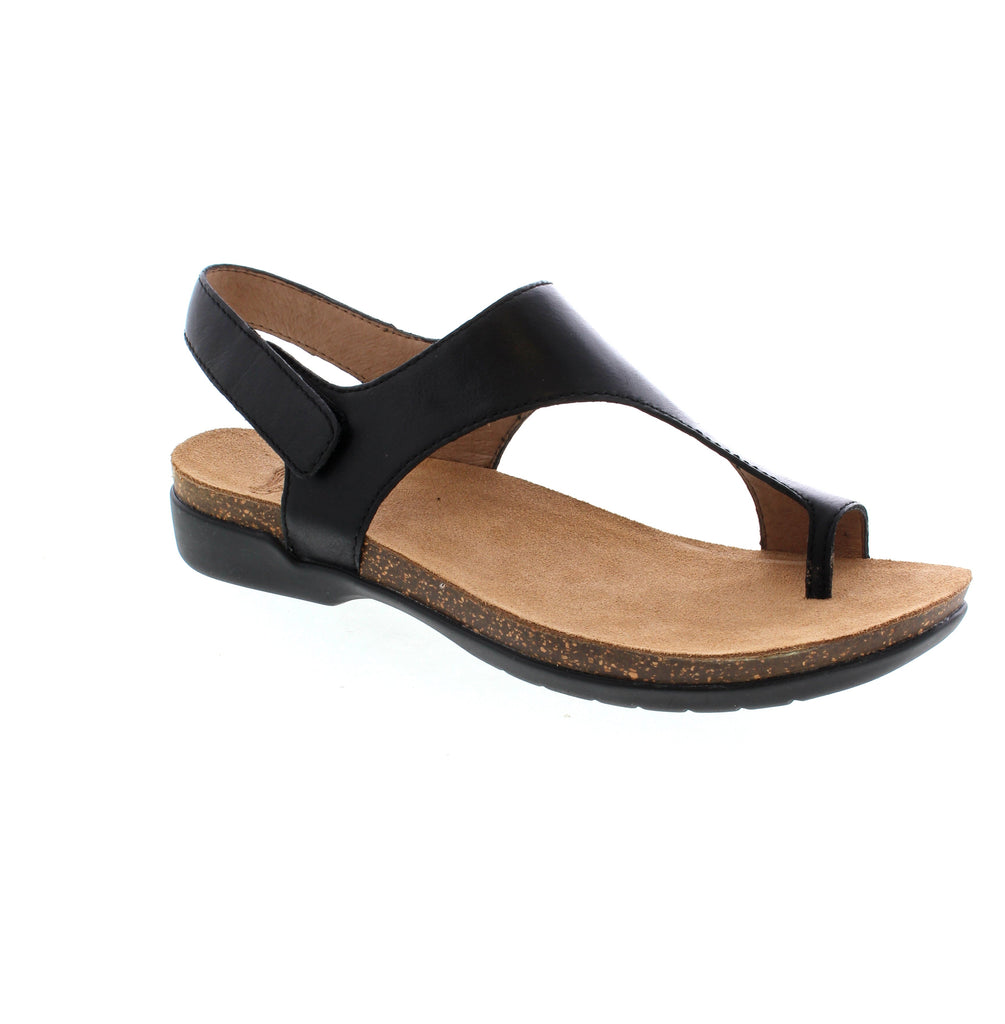 The Dansko Reece is your ticket to comfort that goes everywhere. This versatile black sandal features premium nubuck and suede uppers treated with stain-resistant coating, paired with a soft leather lining. The molded memory foam footbed and lightweight EVA/cork midsole keep your feet cushioned all day long, while the rubber outsole ensures durability. Hook and loop adjustability gives you a custom fit, making it perfect for travel or casual everyday wear.