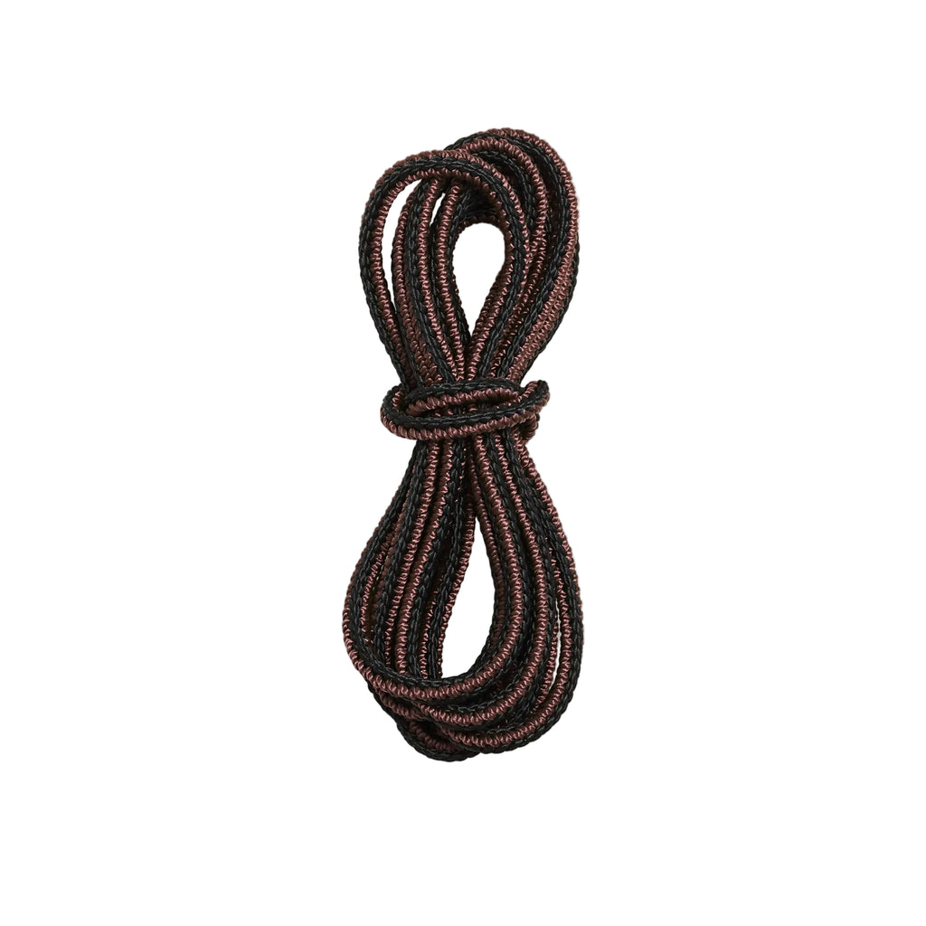 Red Wing 63" Taslan Laces are crafted using the original taslan construction process, ensuring exceptional durability and resistance to pilling over time. These braided laces not only enhance the lifespan of your footwear but also add a distinctive textured look that complements Heritage boots and shoes beautifully. Designed to withstand daily wear, they maintain their strength and appearance in demanding conditions. 