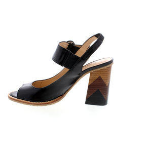 Indulge in luxury with Loracci Rua sandals. Crafted with genuine leather and incredible detailed stacked heels, this pair will elevate any look. Perfect for graduation, dressy occasions, or casual outings, the elasticized upper backstrap provides a comfortable fit. Available in classic black, with a stylish halter strap and buckle closure.