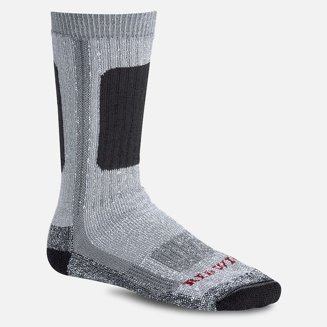 Expertly designed for the working individual, the Red Wing Work Medium Weight Mid-Calf Sock in black offers the perfect combination of softness and absorbency of cotton, and the strength and quick-drying abilities of polyester. This ensures long-lasting comfort and durability.