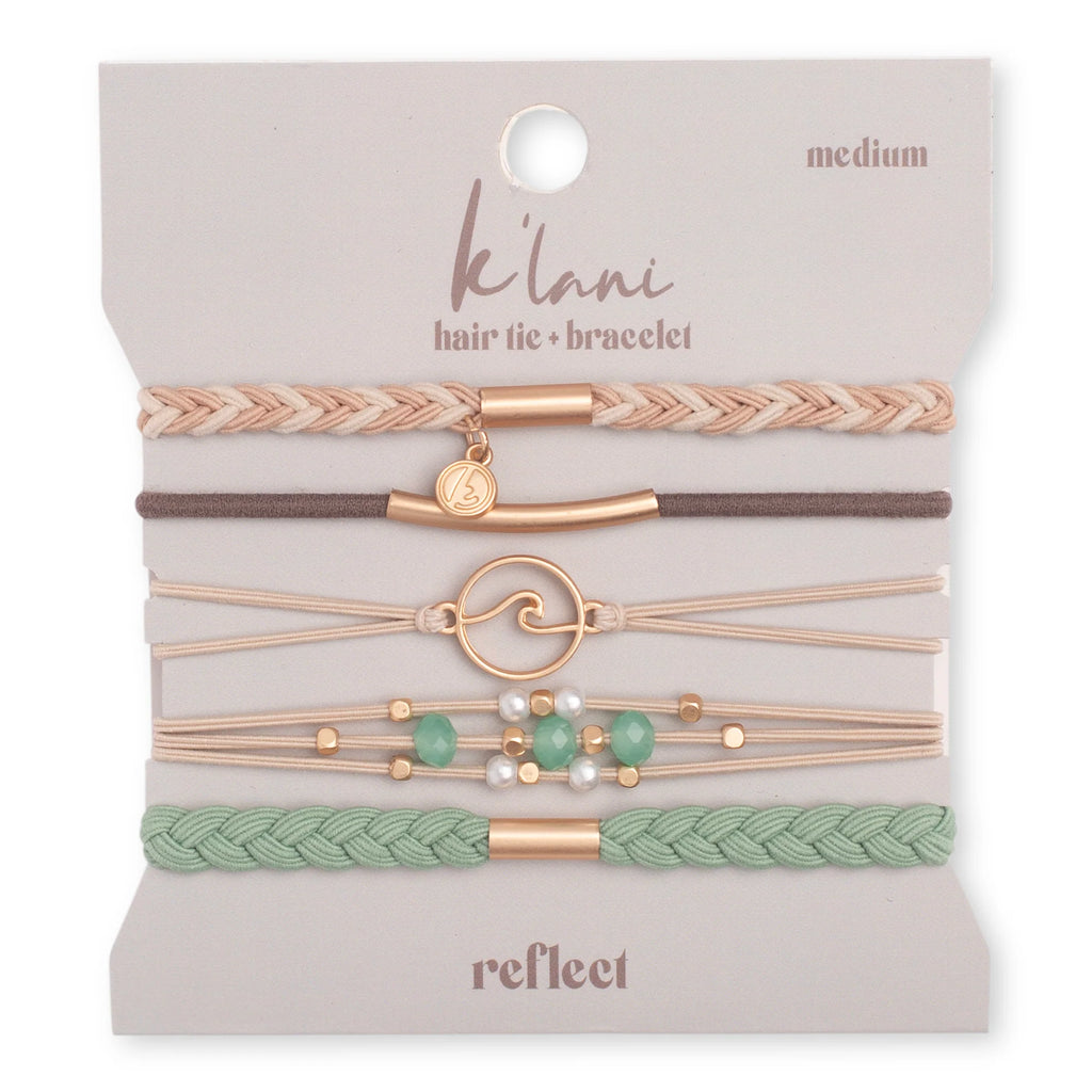 Reflect K'lani set brings the energy of the beach to your style. This set of 5 hair tie bracelets are the perfect accessory made of neutral colors to remind you to calmly go with the flow.