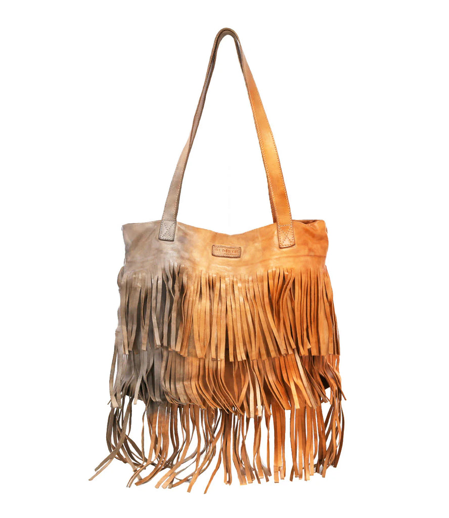 Introducing Rimes by Bed Stu. Long layers of fringe create eye-catching detail, while the roomy interior is built for function. Add a touch of free-spirited movement to your everyday style with this handcrafted leather tote.