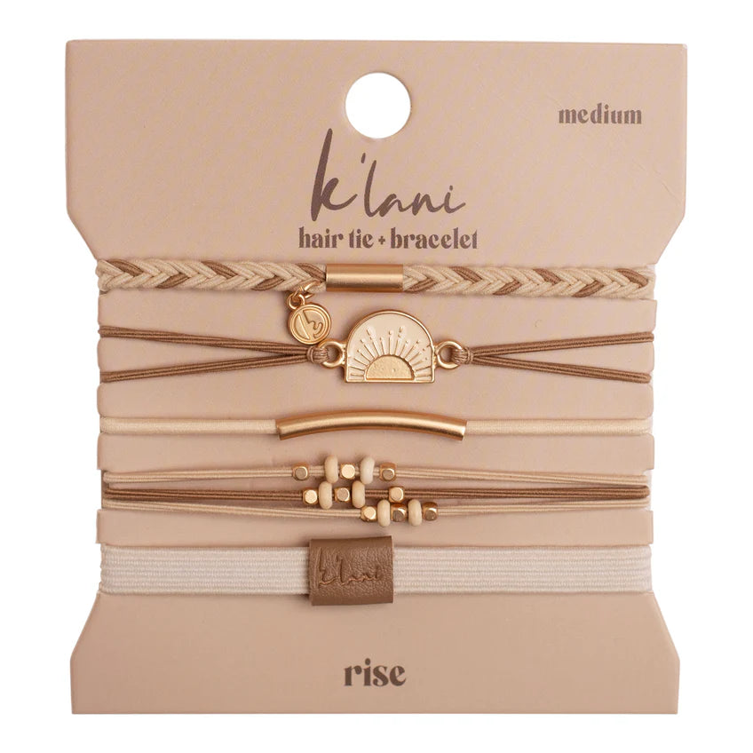 Elevate your style with the K'lani Rise set, featuring five versatile bracelets that also serve as hair ties. Crafted in warm neutral tones with elegant gold and cream accents, these pieces seamlessly complement any outfit. The included sunrise charm symbolizes daily renewal and encourages you to rise and shine in every moment. Perfect for adding subtle sophistication and practical function to your accessory collection.