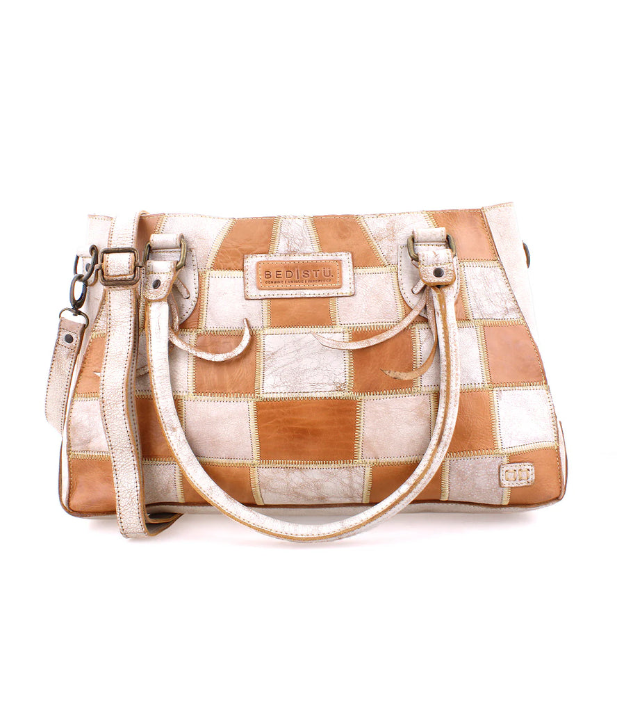 Introducing the Bed Stu Rockababy SL, made from upcycled scrap leather.&nbsp; Each piece creates a one-of-a kind bag.&nbsp; The secure zip-top closure and exterior back pocket will keep you organized in style.&nbsp;