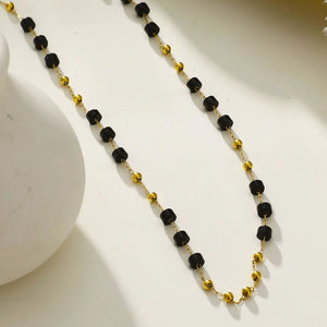 Expertly crafted with high-quality yellow gold, this necklace is a versatile piece for any occasion. With a variety of lengths to choose from, you can customize your look with the perfect fit. Whether it's for a wedding, graduation, or a dressy event, this accessory is nickel-free and offers a sleek black and gold color combination. From the trusted brand, Hackney Nine, this piece is a must-have for any jewelry collection.