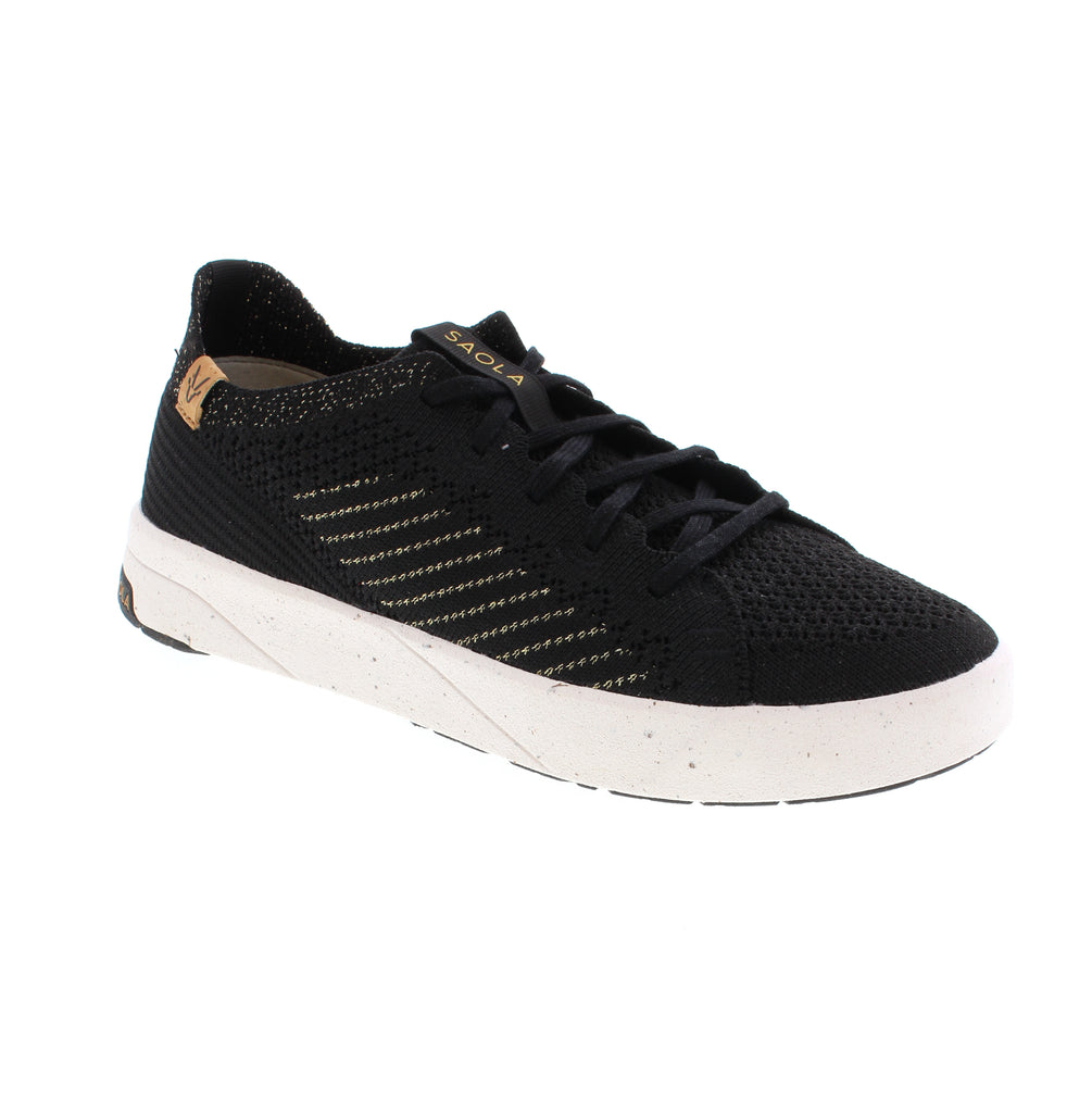 The Saola Cannon Knit 3 W SAO5145-125 sneaker in black combines eco-conscious design with modern comfort. Built with a breathable mesh and fabric upper, microfiber lining, and a removable insole for orthotic support, this vegan-friendly shoe adapts to your needs. The EVA/PU and cork midsole with rubber outsole provides cushioning and stability, while the flatform heel and white sole add contemporary style.