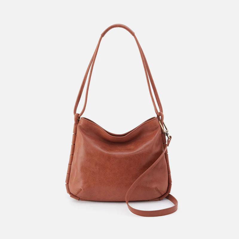 Expertly crafted with a chic design and spacious interior, the Hobo Bags Phoebe Bag is the perfect tote for everyday use. With enough room for your laptop and more, this bag is both stylish and functional.&nbsp;