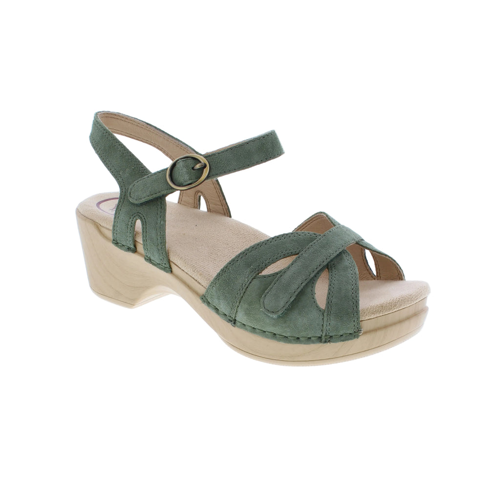 Dansko's Season sandal delivers sophisticated style with practical comfort for warm-weather occasions. Crafted from premium suede with a supportive foam midsole, this black halter-strap design features a round toe and modest 1-2" block heel for stability. Perfect for weddings, graduations, or everyday wear.