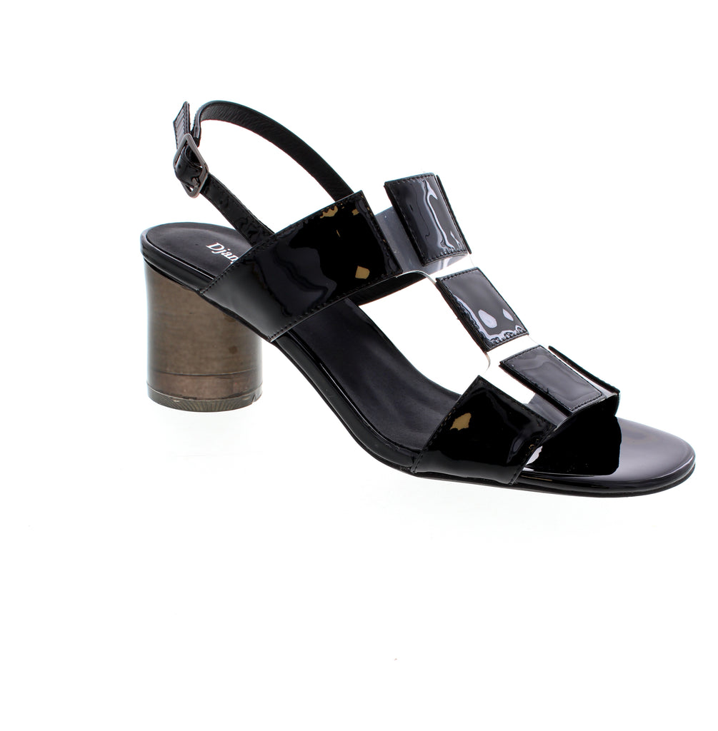 Django &amp; Juliette Seymour is crafted from panels of shimmering leather and vinyl.  Worn with everything from skirts to denim, this show-stopping pair will be the focal point of any outfit.