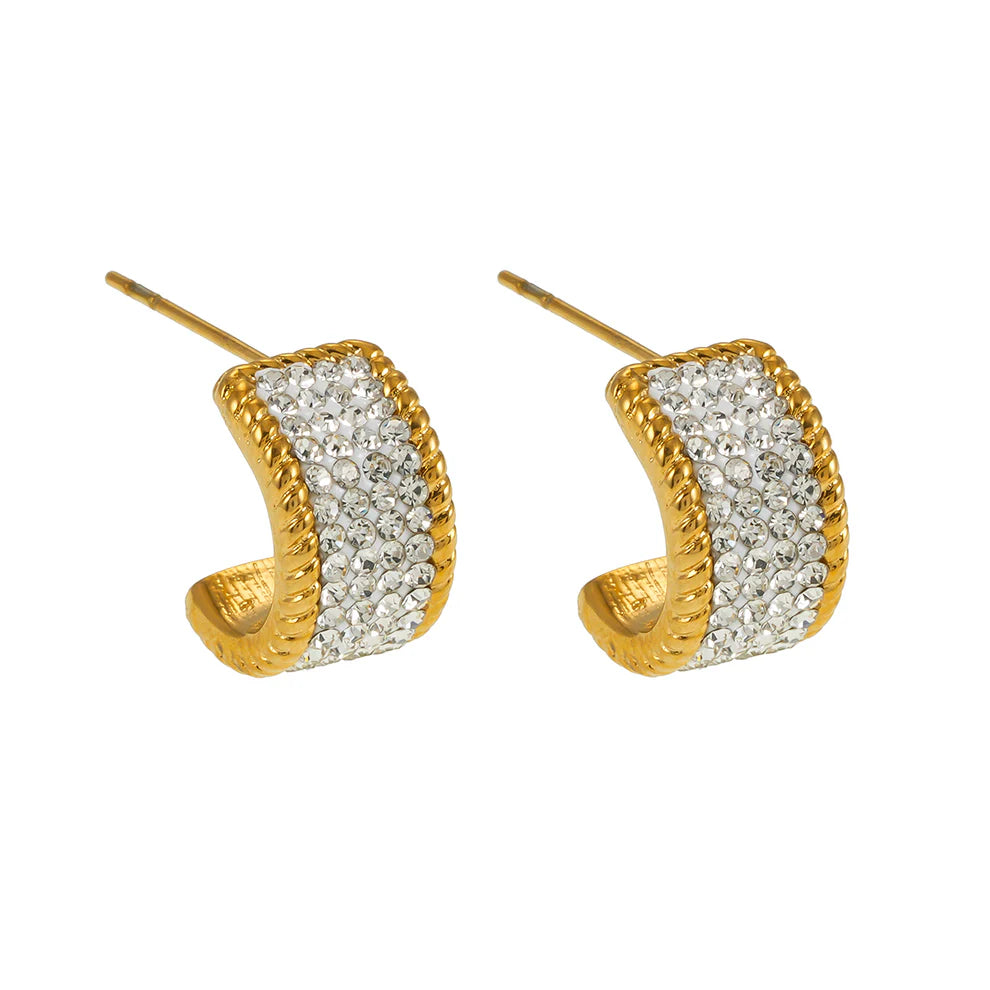 These Quadruple-Row Pave Zirconia Hoop Stud Earrings deliver brilliant sparkle with four rows of carefully set cubic zirconia stones. The pave design catches light beautifully, making them versatile enough for both formal events and everyday wear. A sophisticated addition to any jewelry collection.
