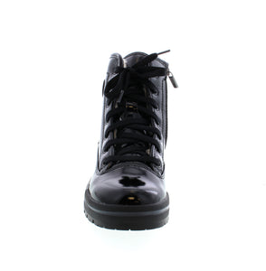 These Olang Spoke - Black winter boots are for the fearless fashionista who's ready to take on the winter weather! With their chic patent man made leather-style material and reliable grip on icy streets, these boots are the perfect winter companion when you're on the move! Go ahead - strut your stuff on the winter streets!